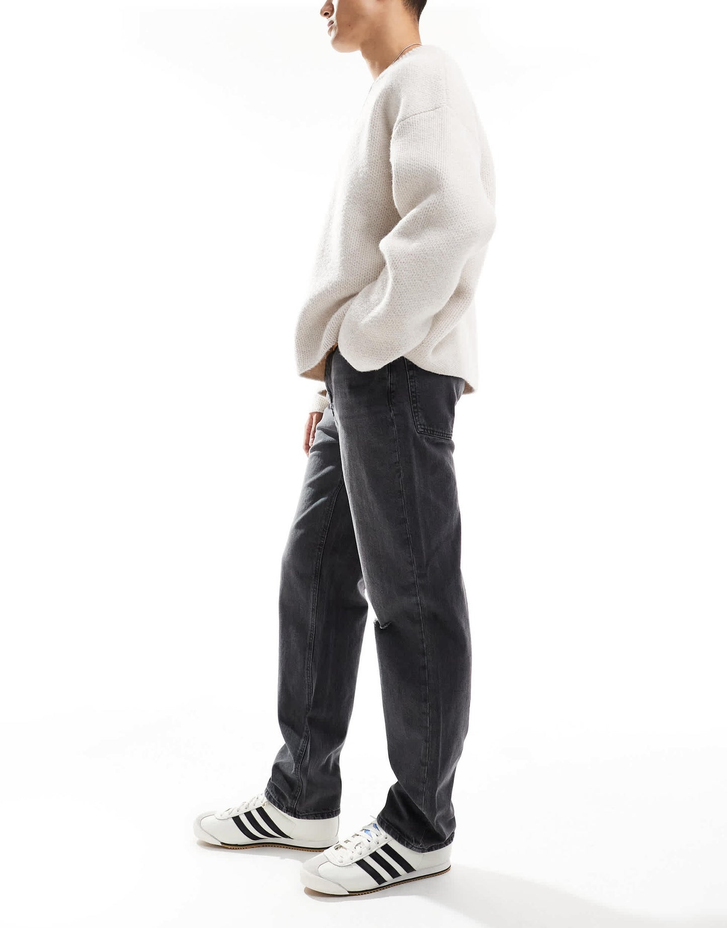 ASOS DESIGN straight leg jeans with rips in washed black