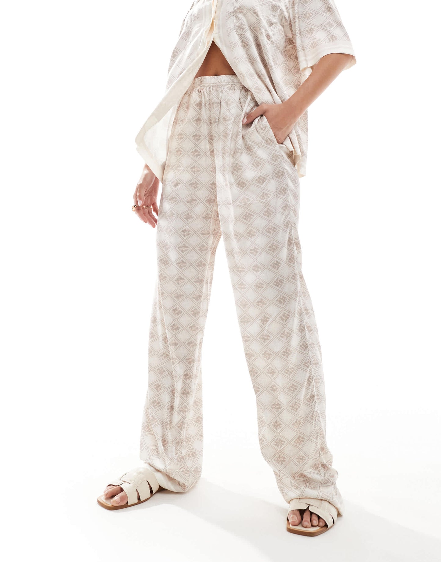 The Couture Club co-ord emblem print wide leg trousers in beige