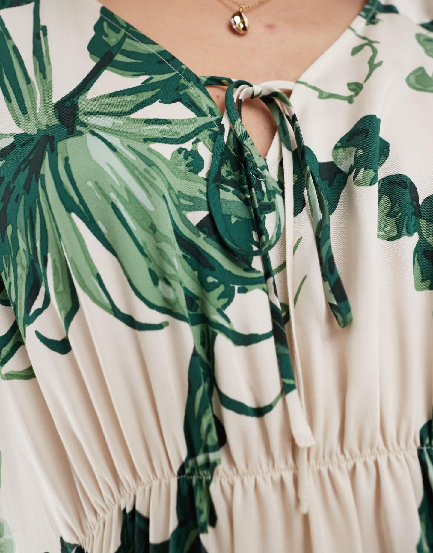 & Other Stories maxi dress with tie front v-neckline and long sleeves in floral leaf print