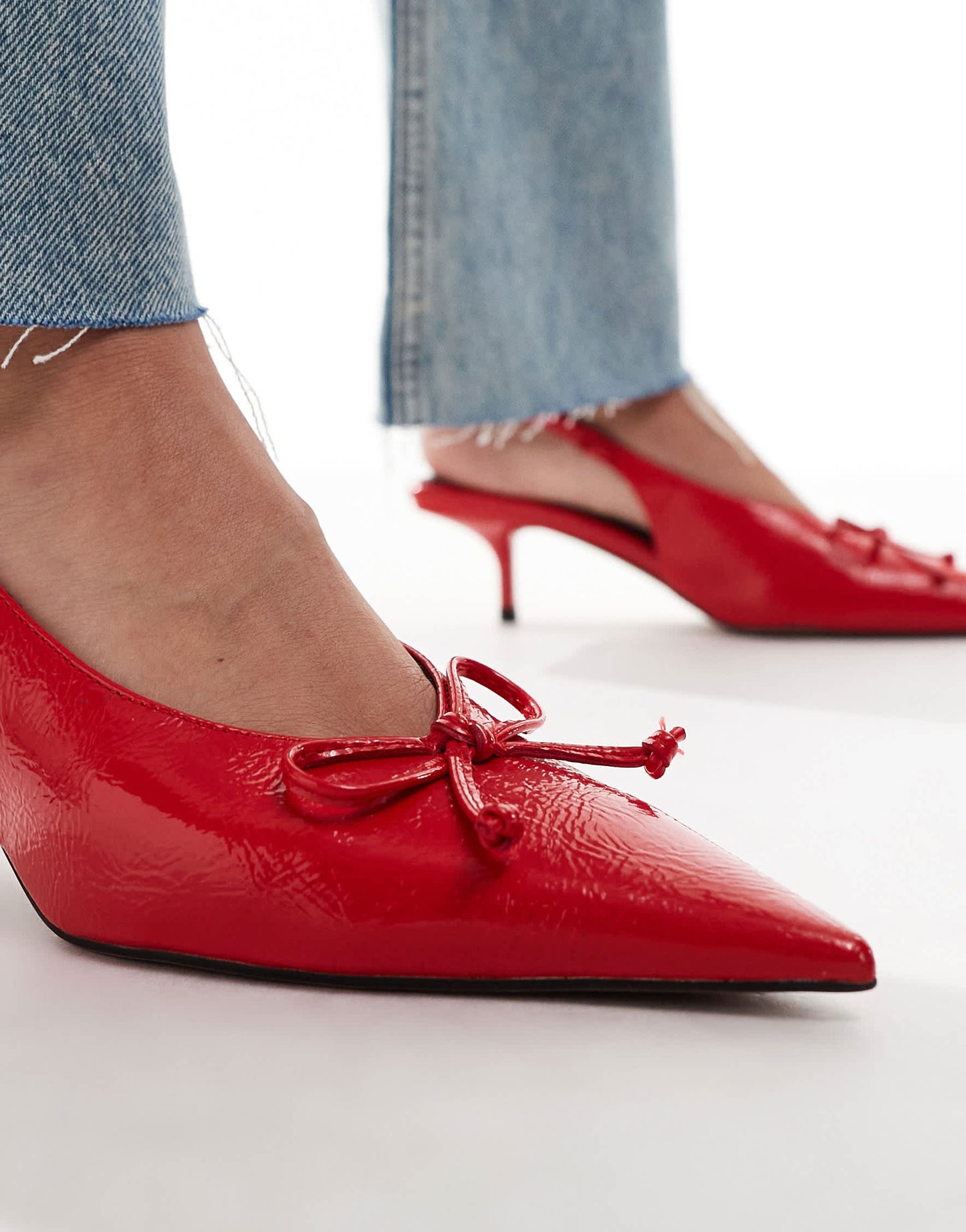 ASOS DESIGN Sriracha bow slingback mid heeled shoes in red