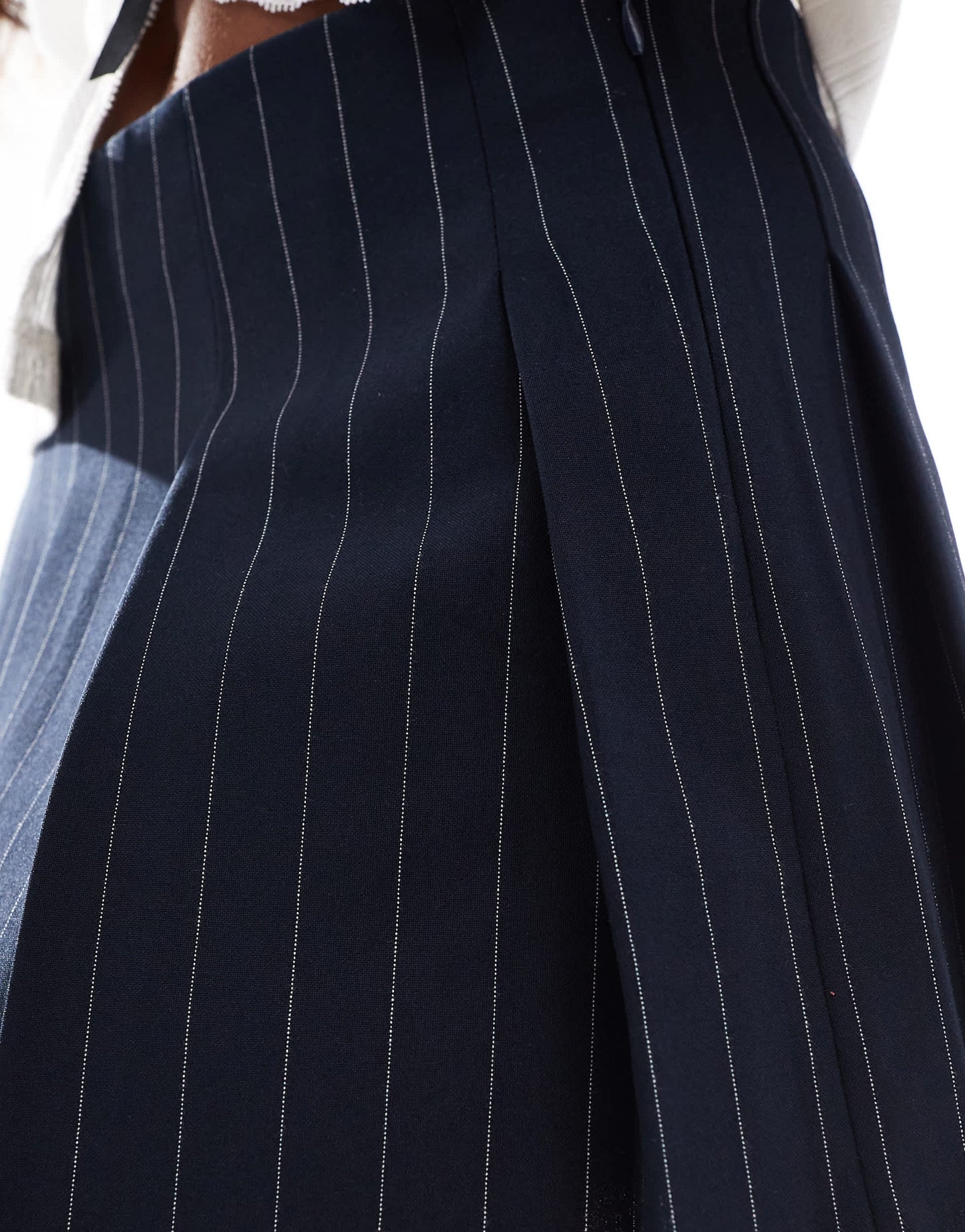 ASOS DESIGN Petite tailored pleated mini skirt in navy stripe
