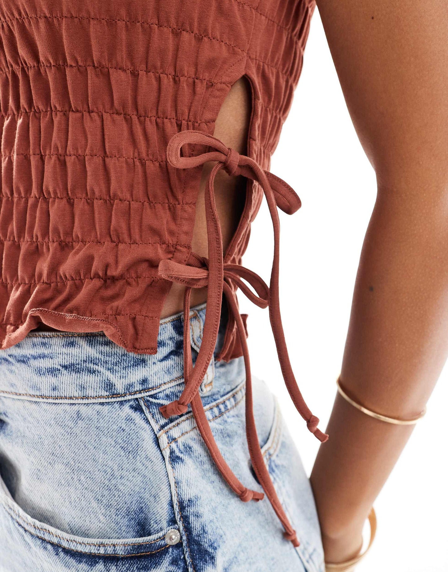 ASOS DESIGN textured short sleeve top with tie sides in rust