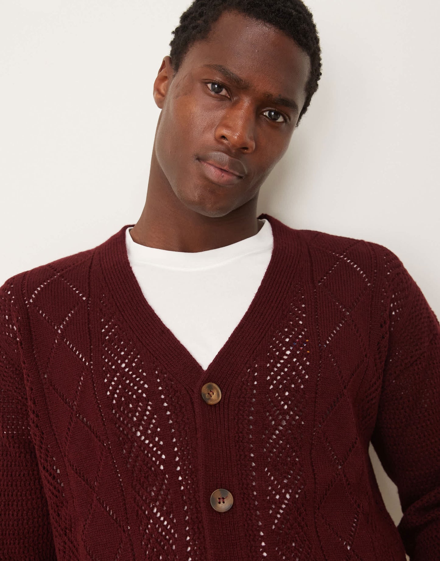 ASOS DESIGN relaxed knitted cardigan with aztec pattern in burgundy