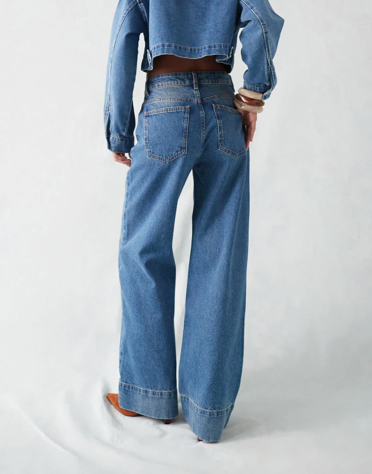 ASOS DESIGN wide leg jean with deep hem in mid blue