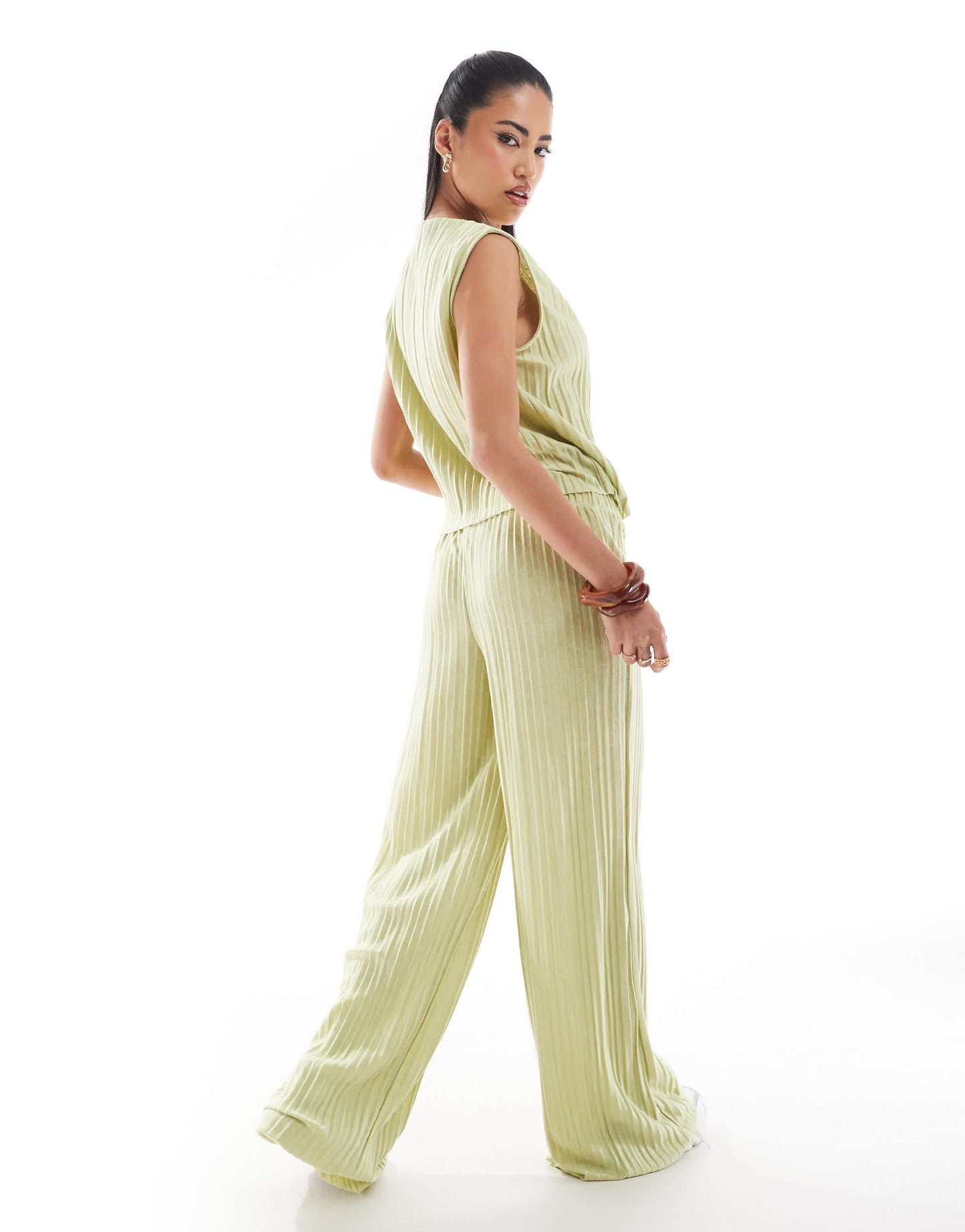 ASOS DESIGN wide leg mid rise plisse trousers co ord in sage green