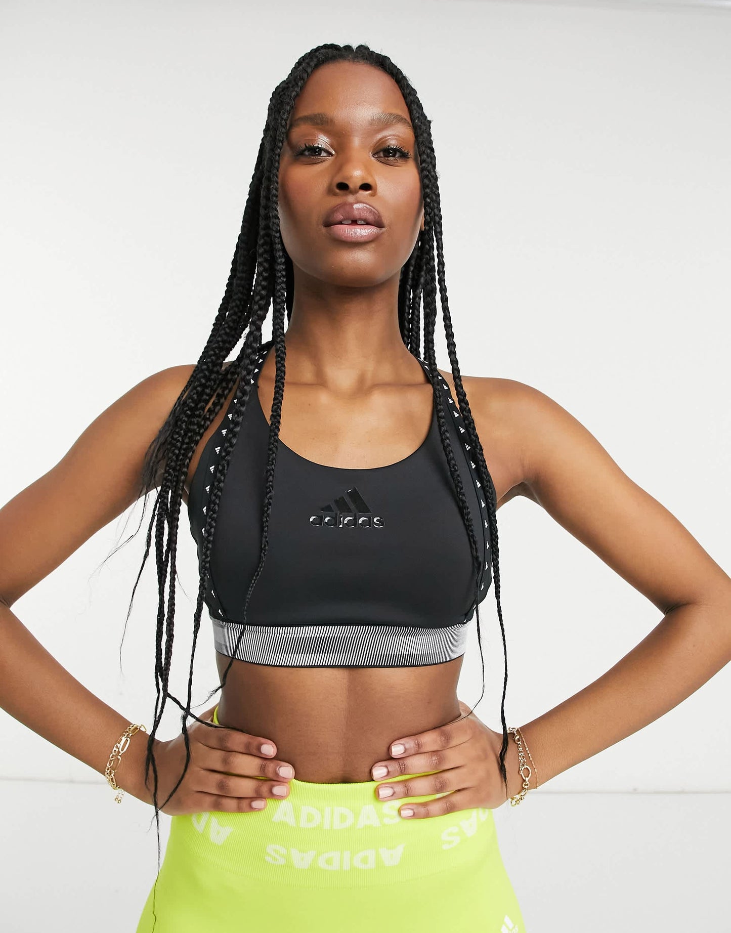 adidas Training mid support bra with taped logo in black