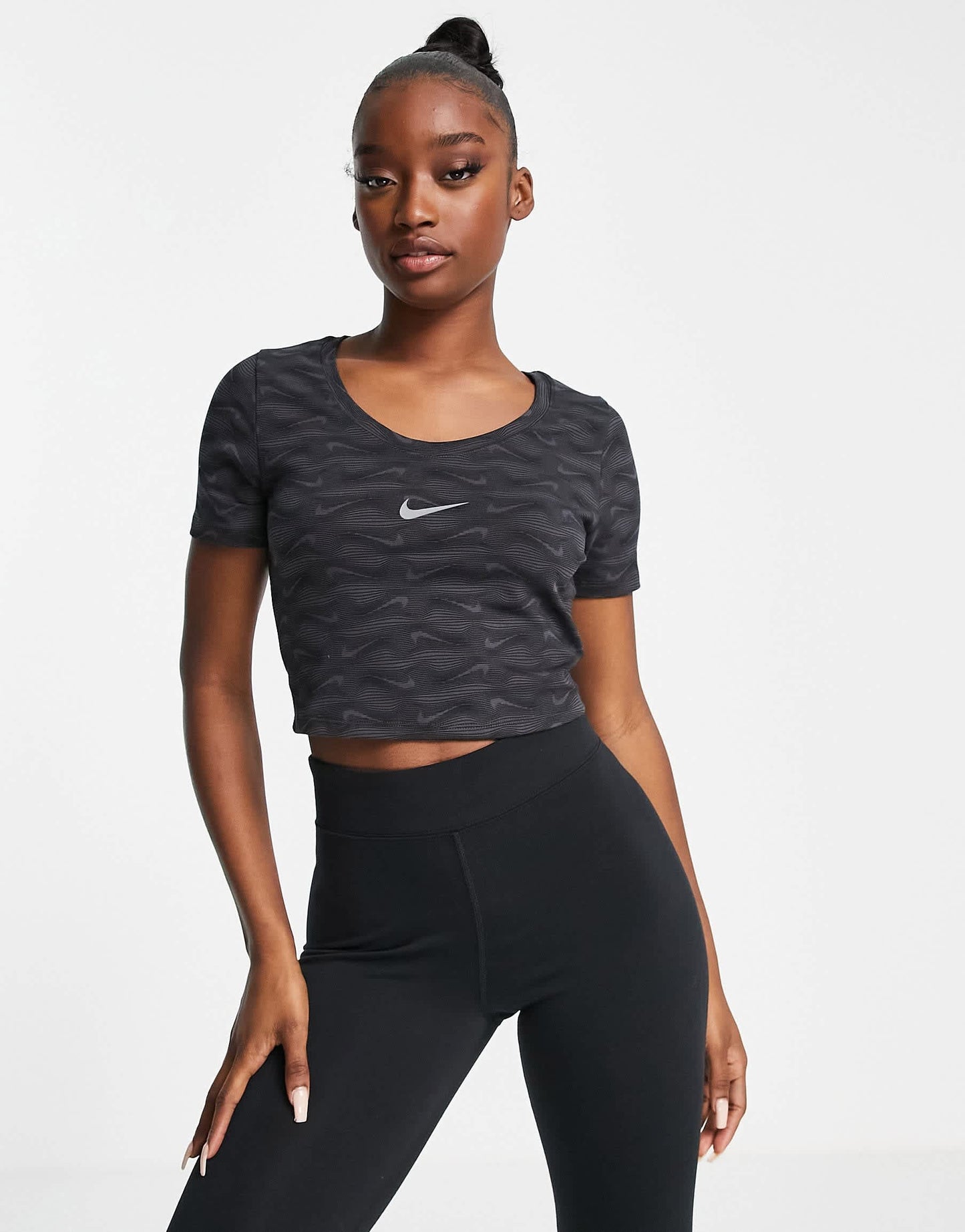 Nike all over printed logo cropped t-shirt with scoop neck in black