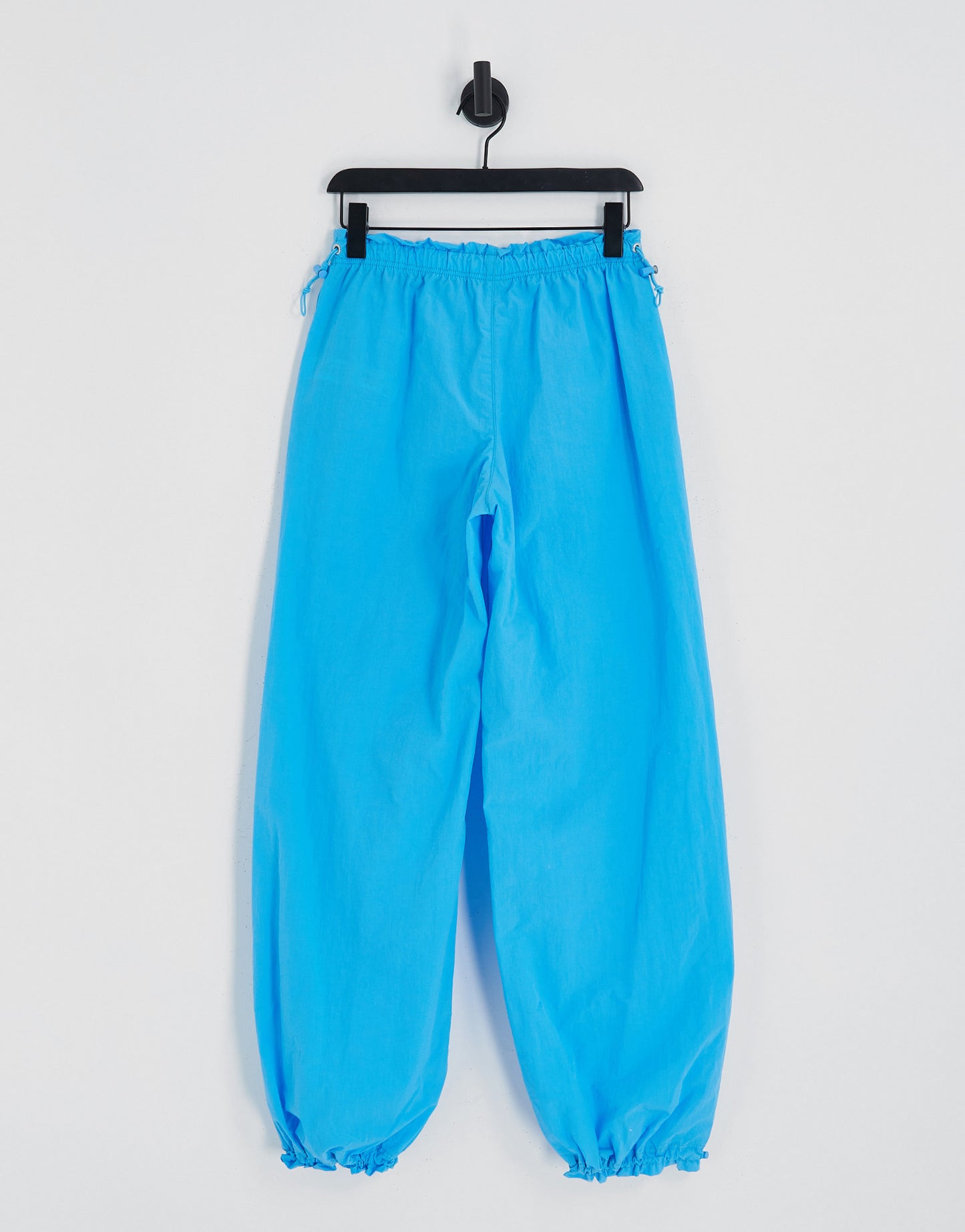 Bershka baggy parachute tech pant in blue