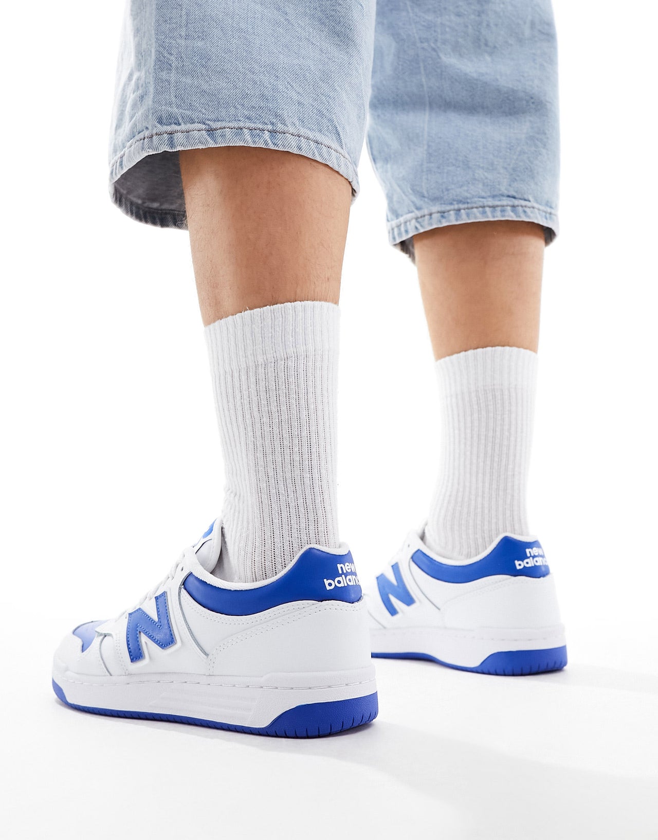 New Balance 480 trainers in white and blue