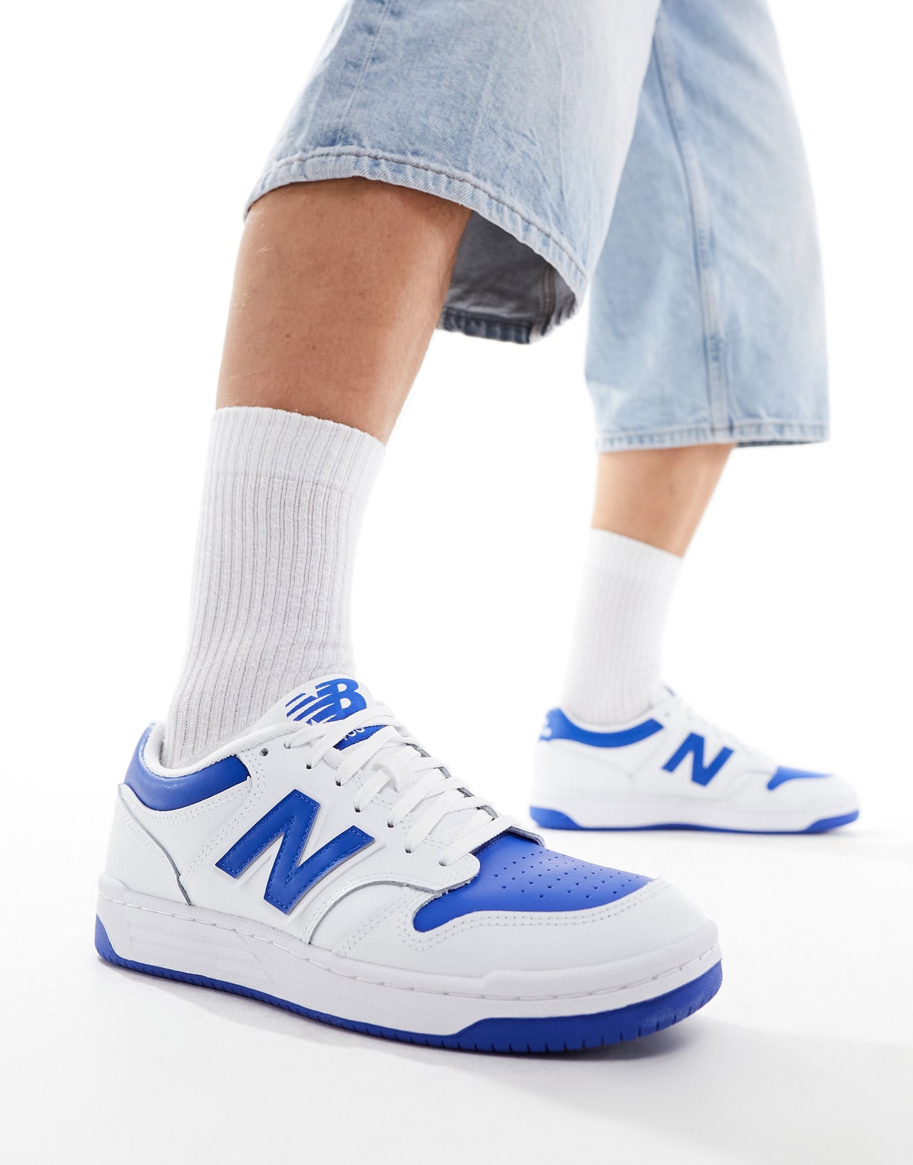 New Balance 480 trainers in white and blue
