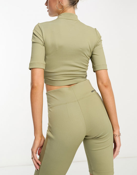Nike Sport Utility rib crop top in neutral olive