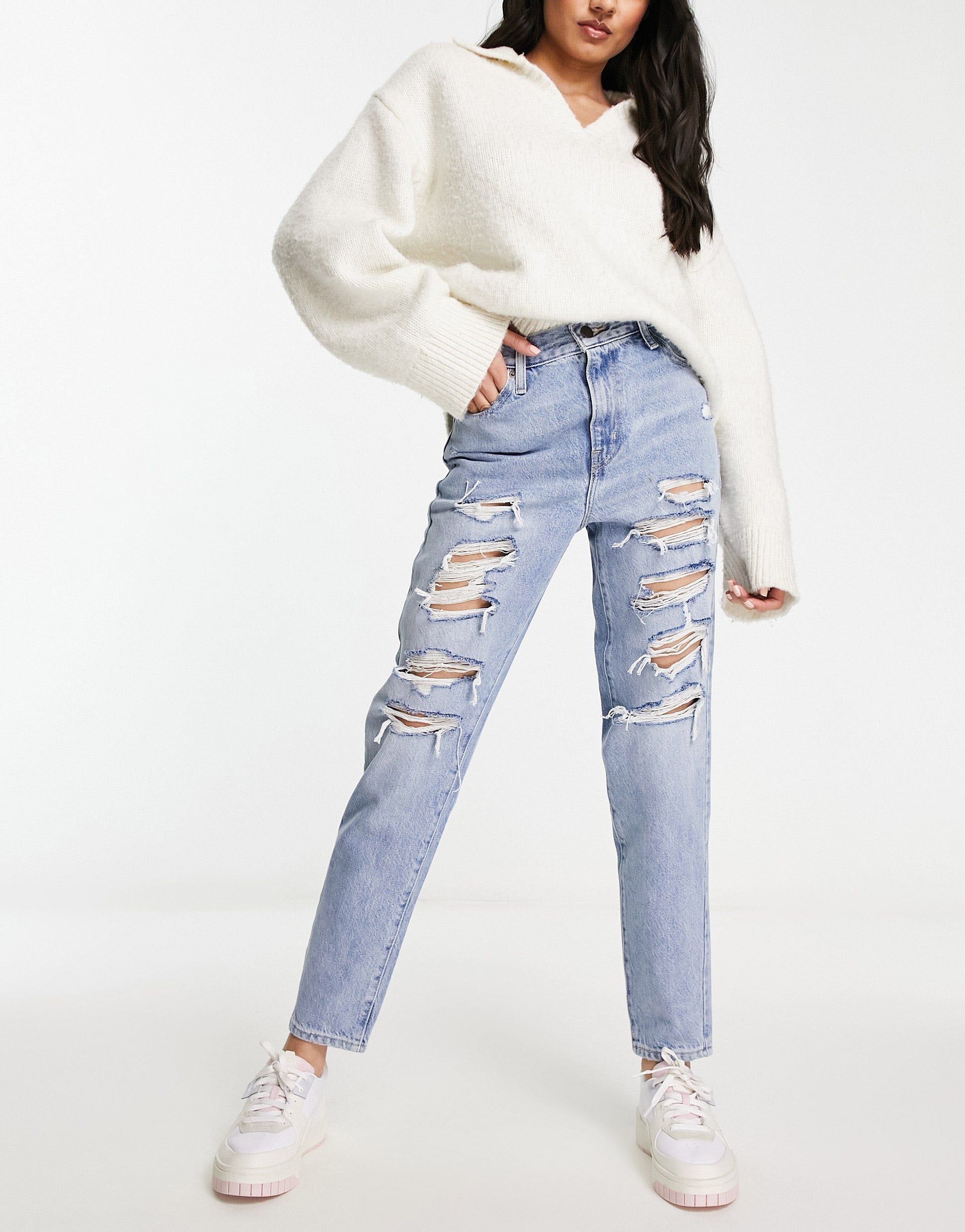 Levi's high waisted distressed mom jeans in light wash blue ASOS