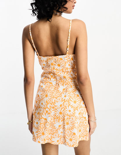 ASOS DESIGN linen wrap cami mini sundress with button detail in floral print