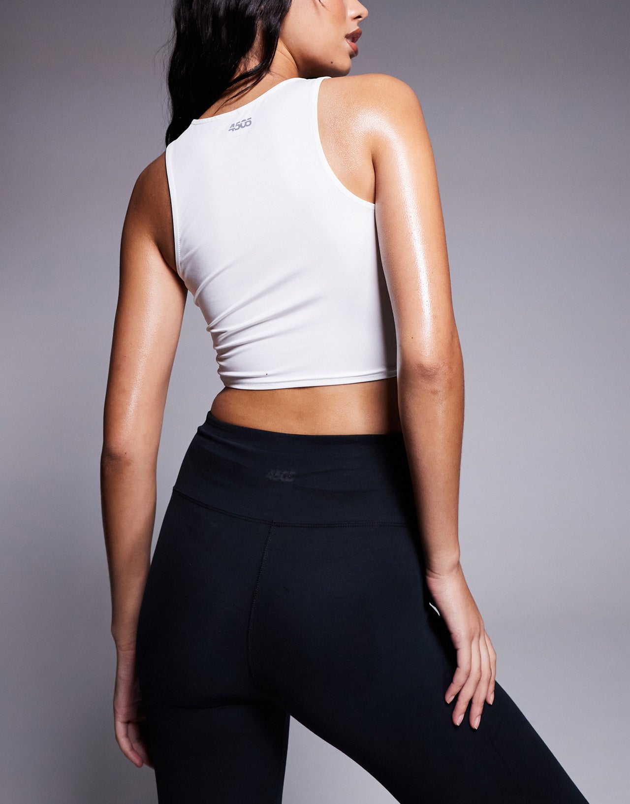 4505 icon slightly cropped vest top in white