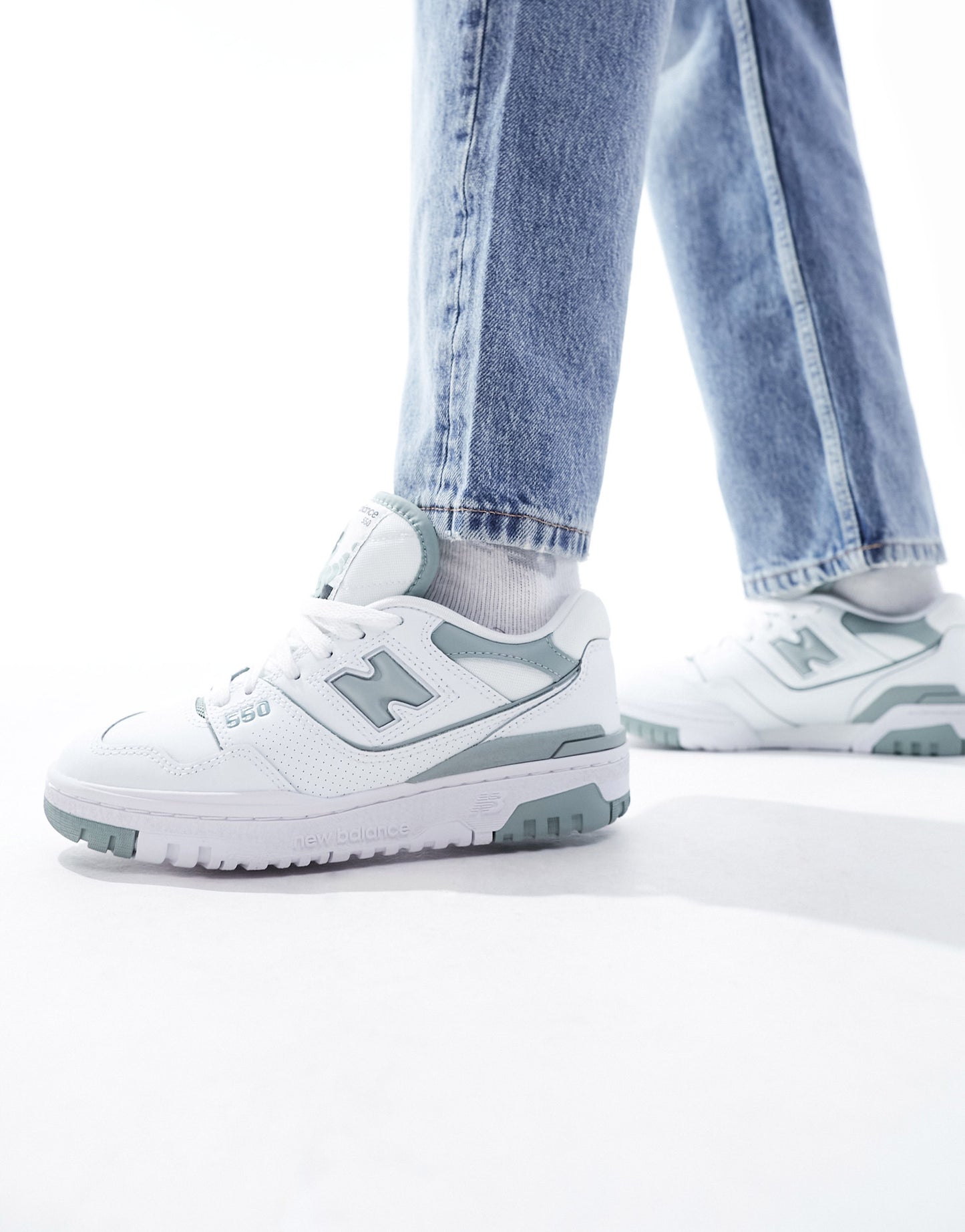 New Balance 550 trainers in white and sage