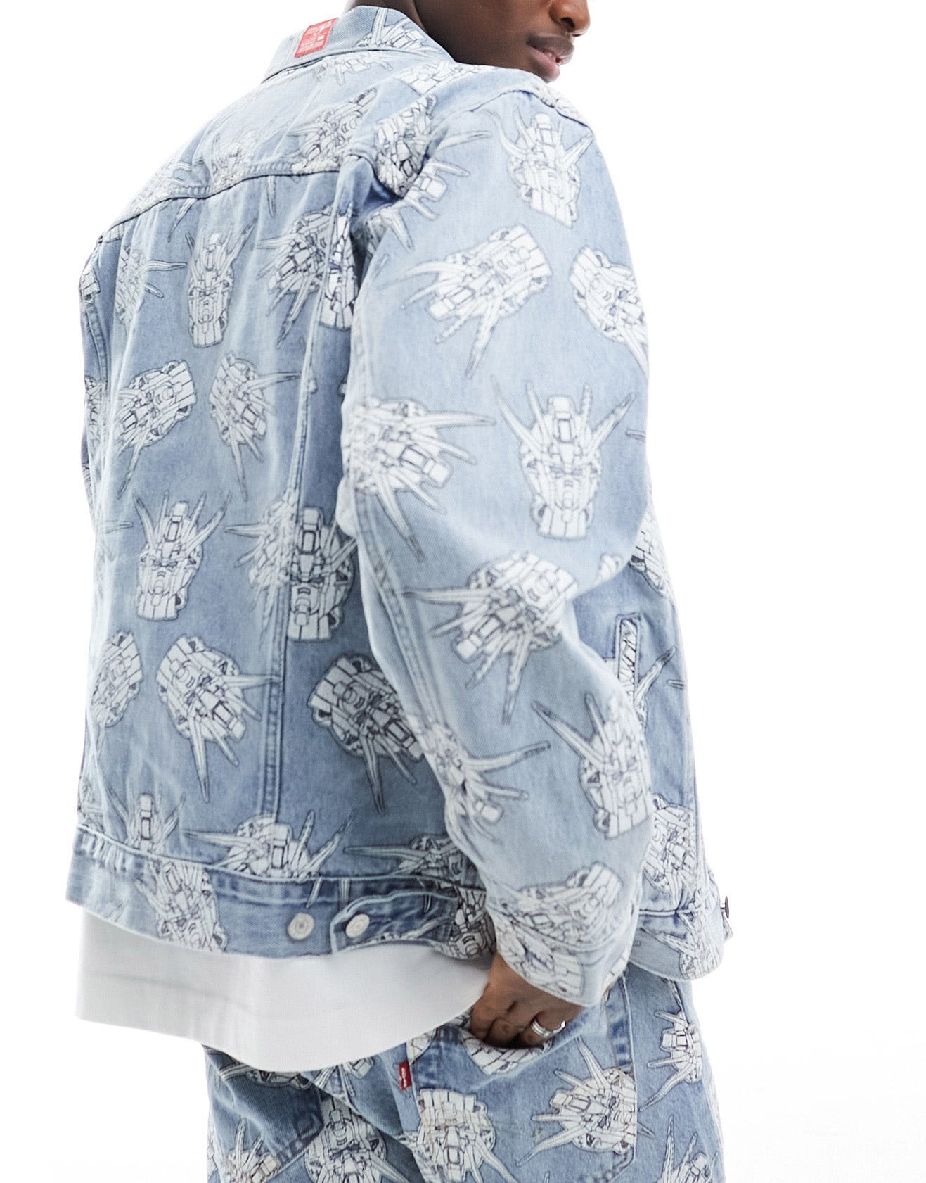 Levi's X Gundam collab starfighter all over print relaxed fit denim trucker jacket in light wash