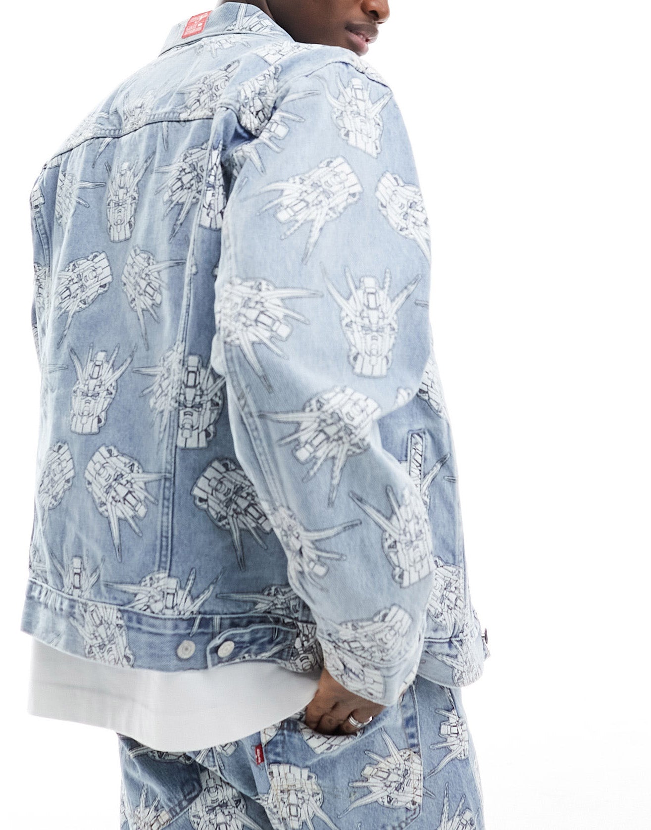 Levi's X Gundam collab starfighter all over print relaxed fit denim trucker jacket in light wash