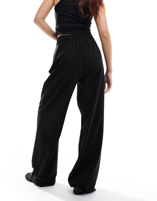 Stradivarius tailored pleat front trousers in black