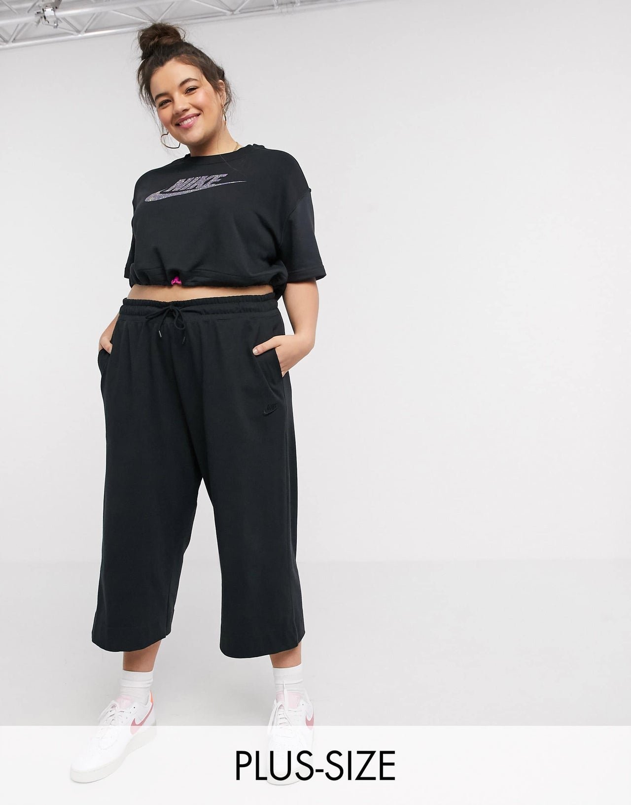 Nike Plus premium tonal cropped wide leg joggers in black