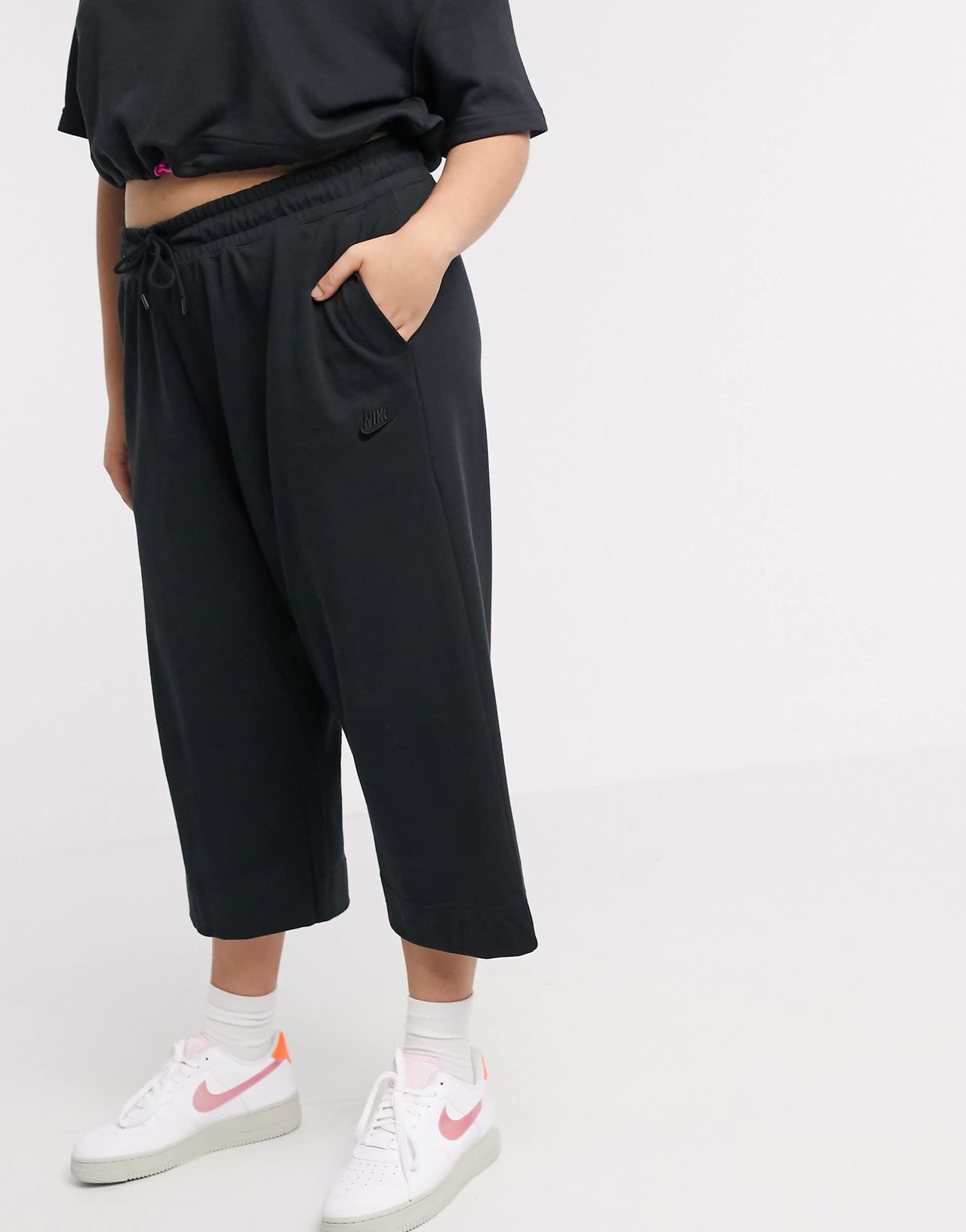 Nike Plus premium tonal cropped wide leg joggers in black