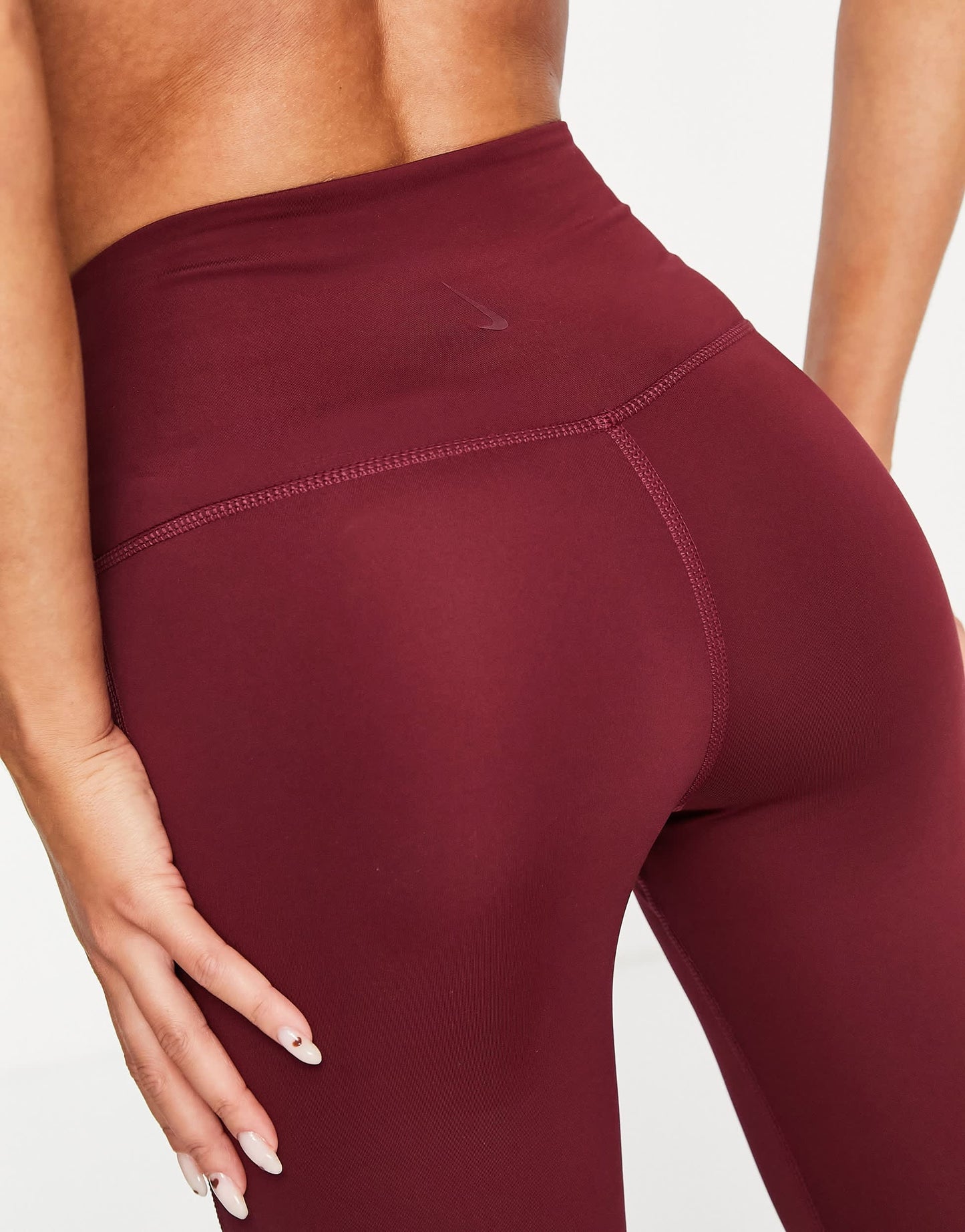 Nike Yoga Dri-FIT lurex tape 7/8 high-waisted leggings in burgundy