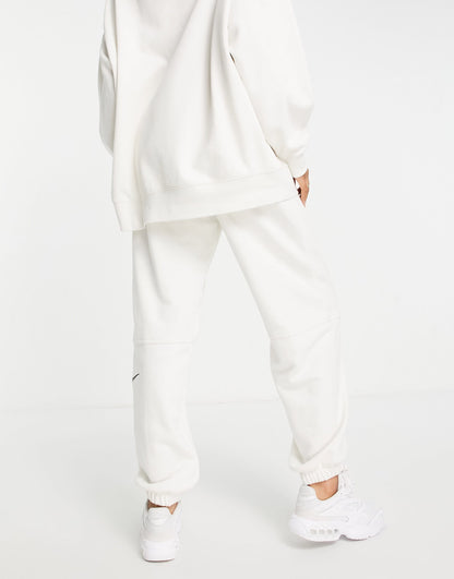 Nike Swoosh fleece joggers in phantom white