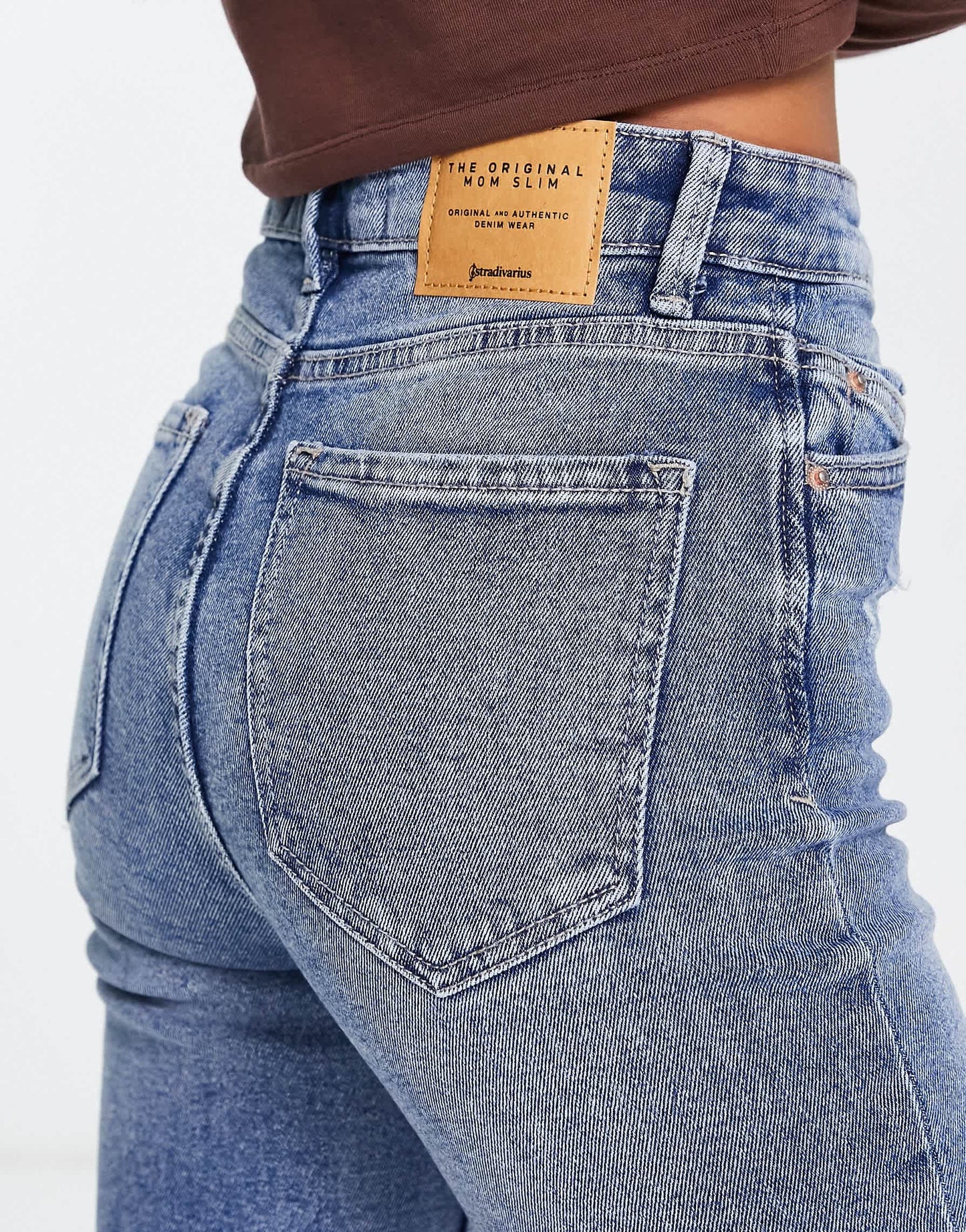 Stradivarius Petite slim mom jean with stretch and rip in authentic blue