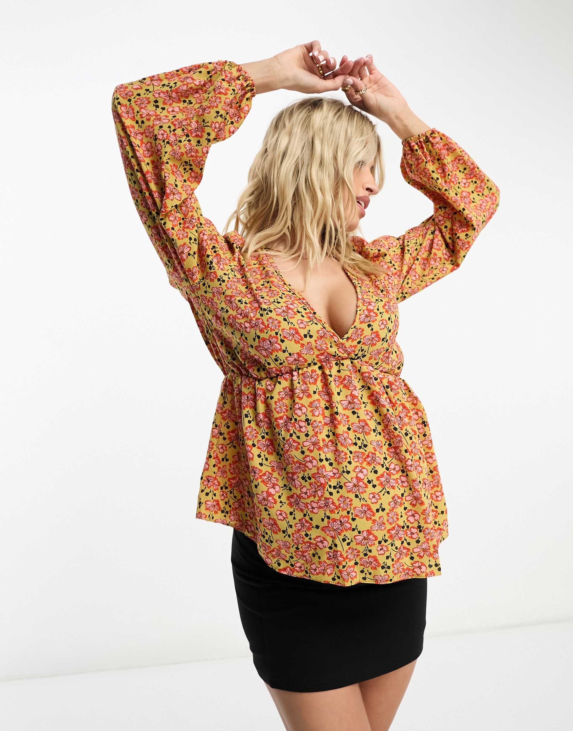 ASOS DESIGN Maternity v neck volume sleeve top with peplum hem in mustard print