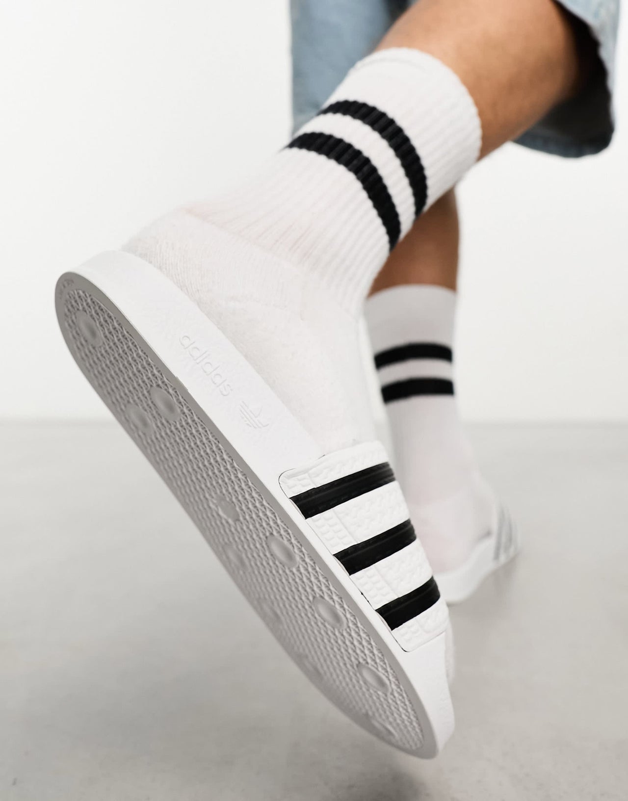 adidas Originals adilette sliders in white and black