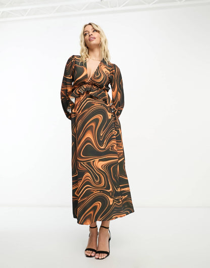 Queen Bee Maternity ruched long sleeve dress in swirl print
