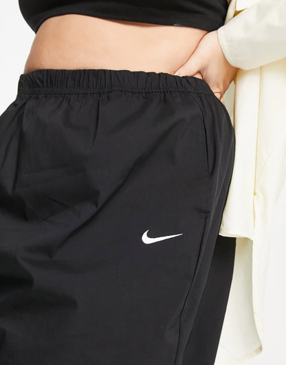 Nike Plus Essential woven high waisted skirt in black