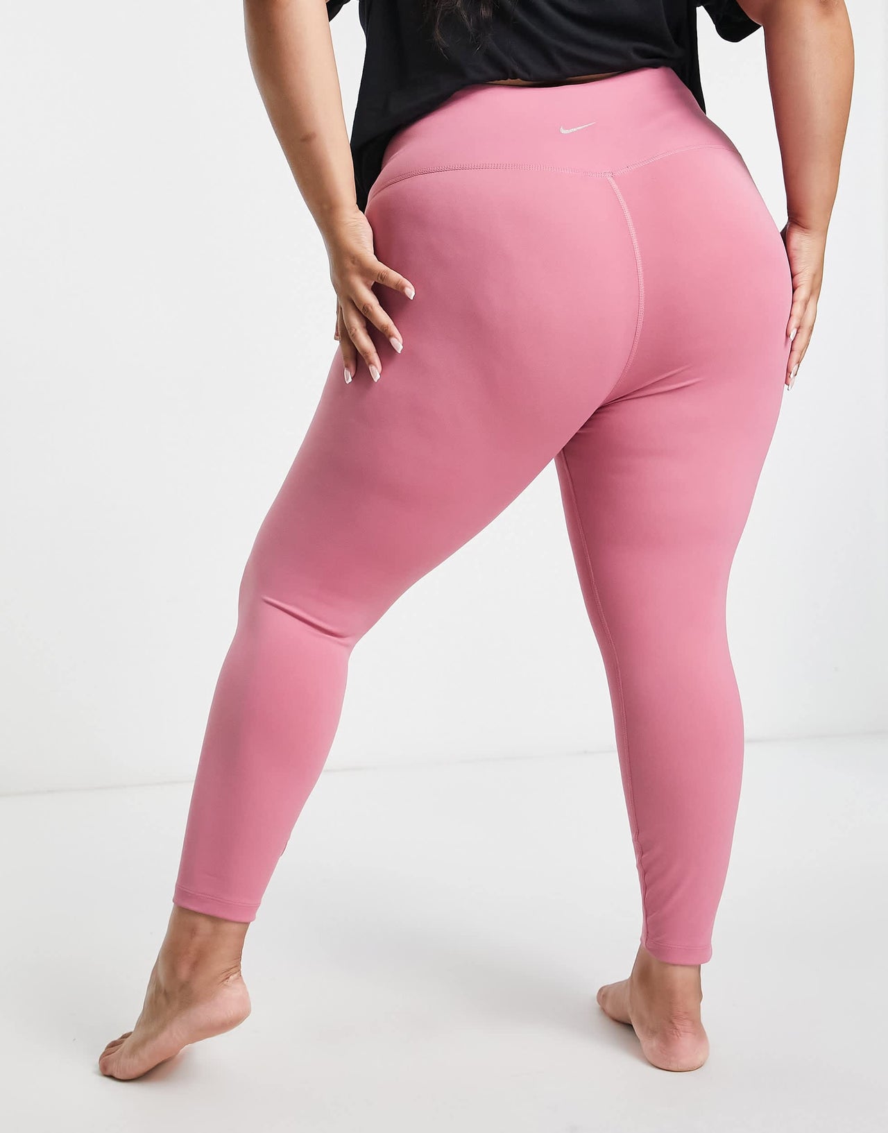 Nike Yoga Plus Dri-FIT high rise 7/8 leggings in pink