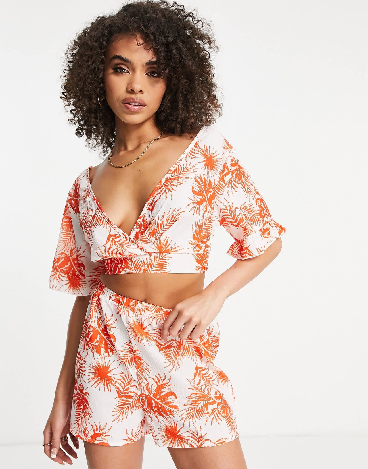 Parisian flutter sleeve crop top co-ord in orange tropical floral