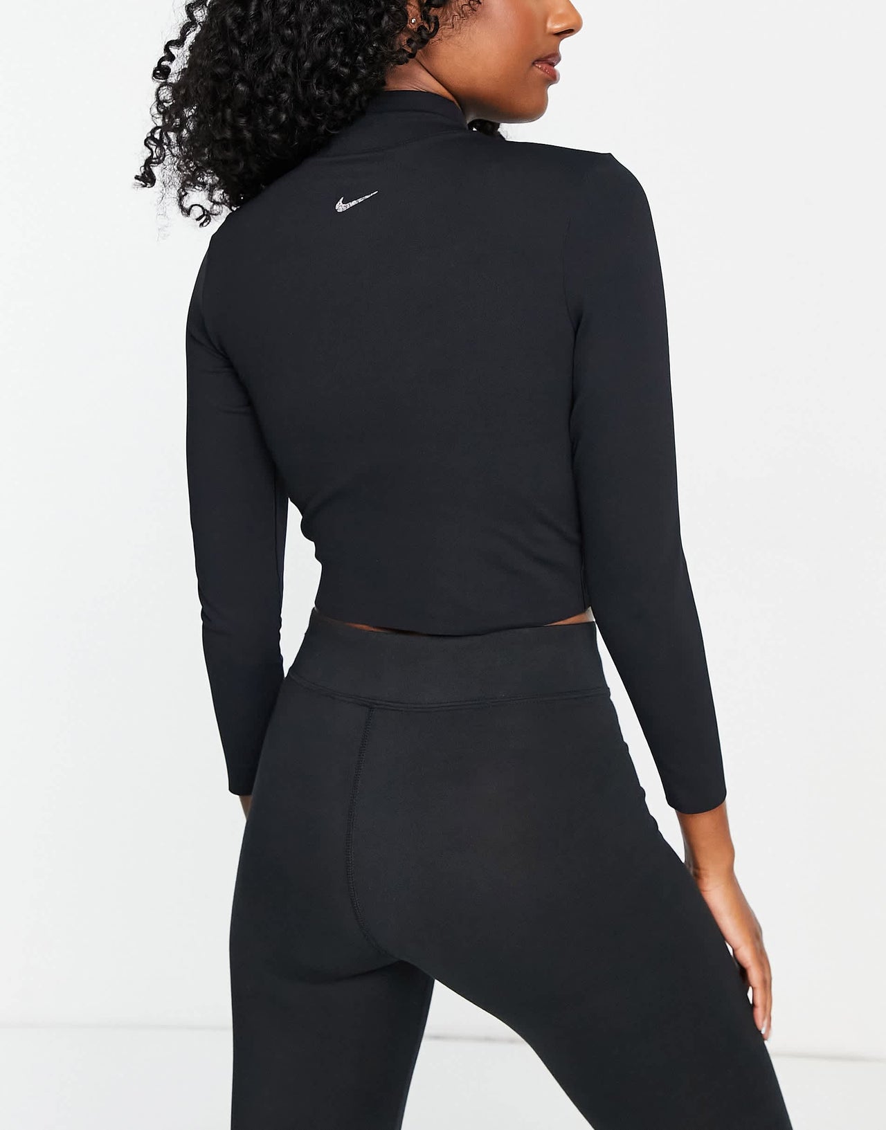 Nike Yoga Luxe Dri-FIT cropped long sleeve top in black