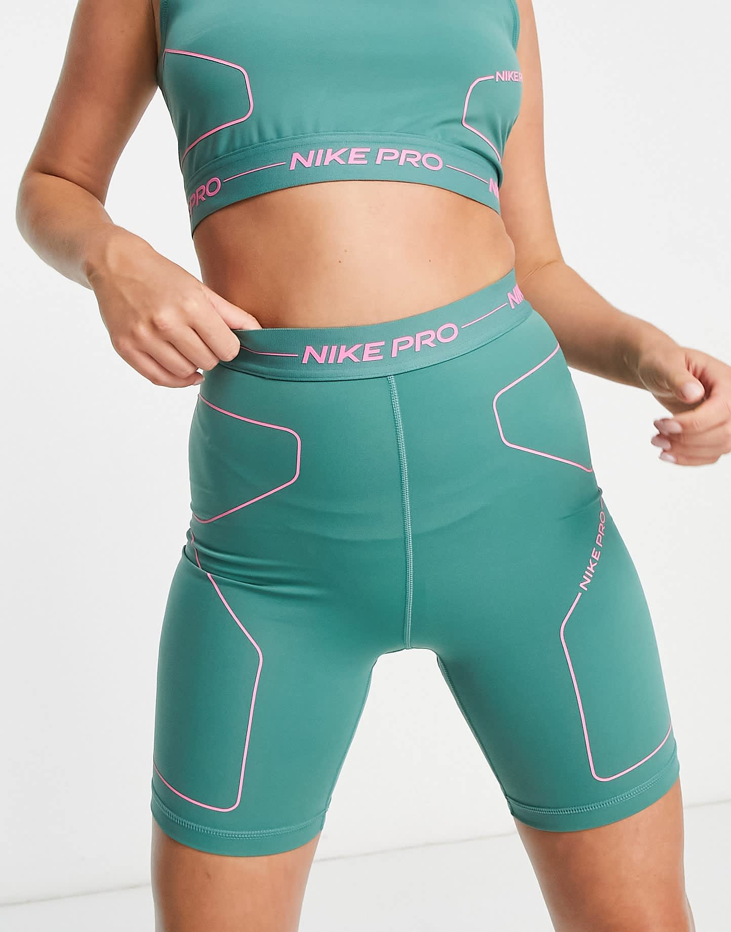 Nike Pro Training Seasonal high rise booty shorts in green and pink