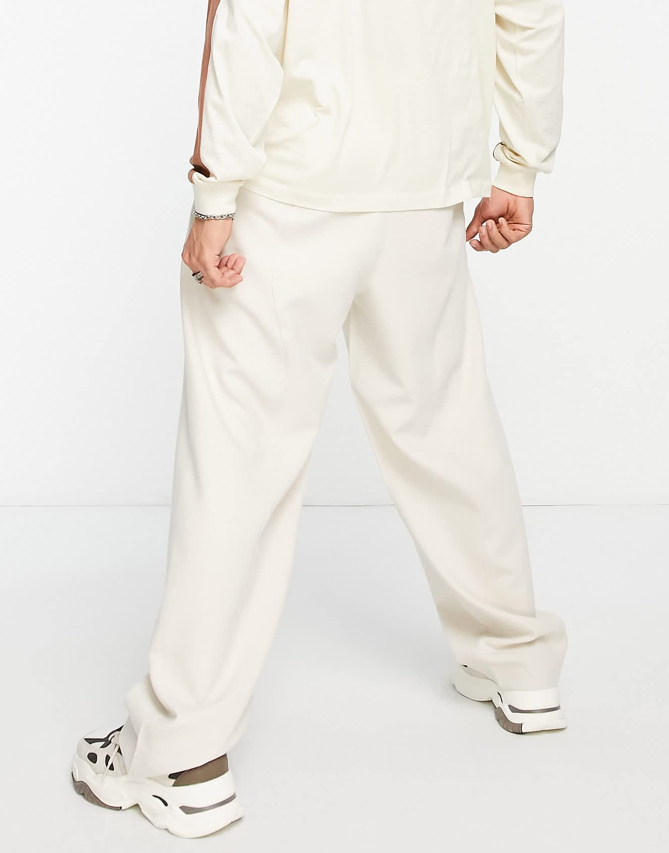 Bershka wide fit tailored trousers in beige
