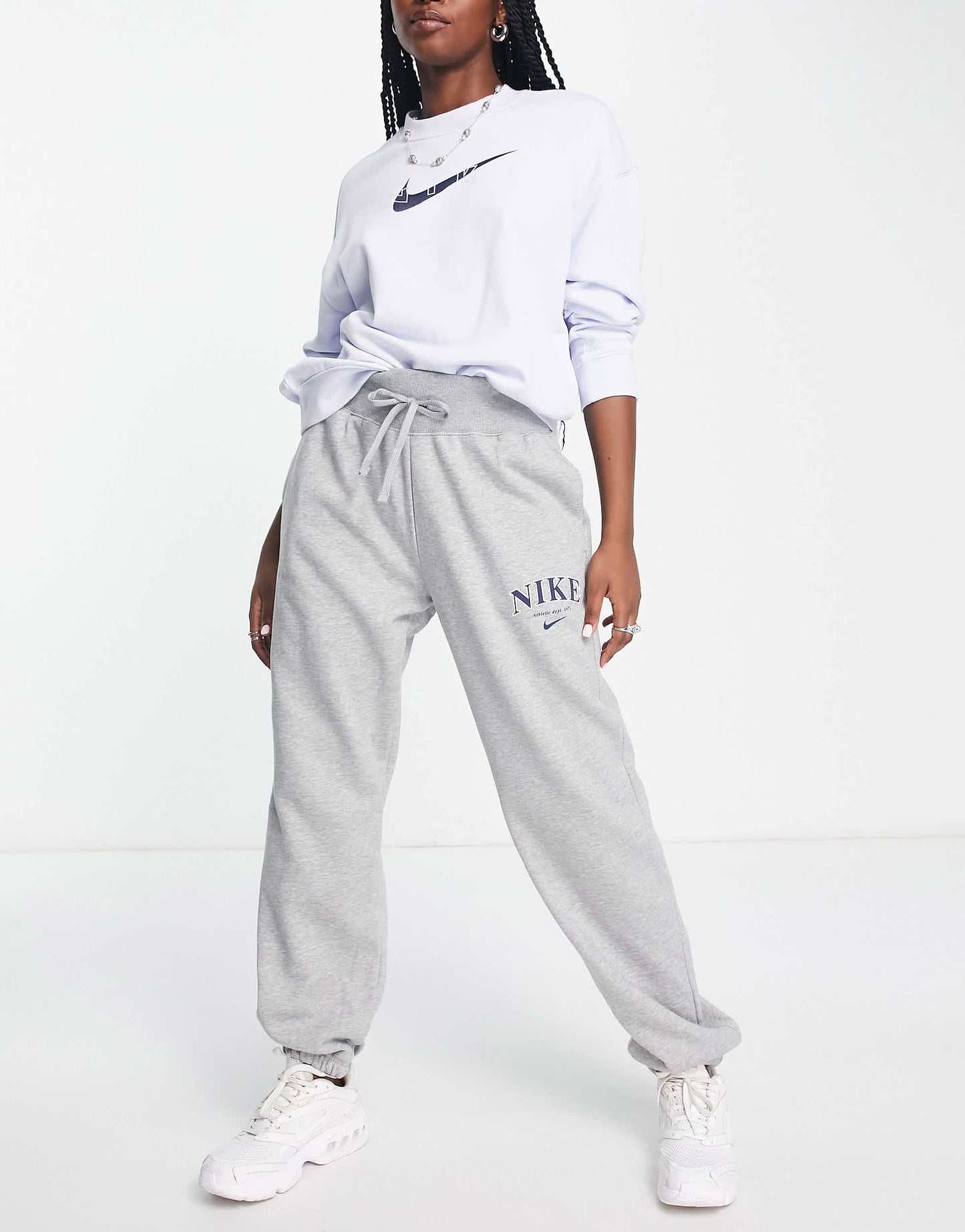 Nike Unisex retro athletics fleece joggers in grey heather and navy