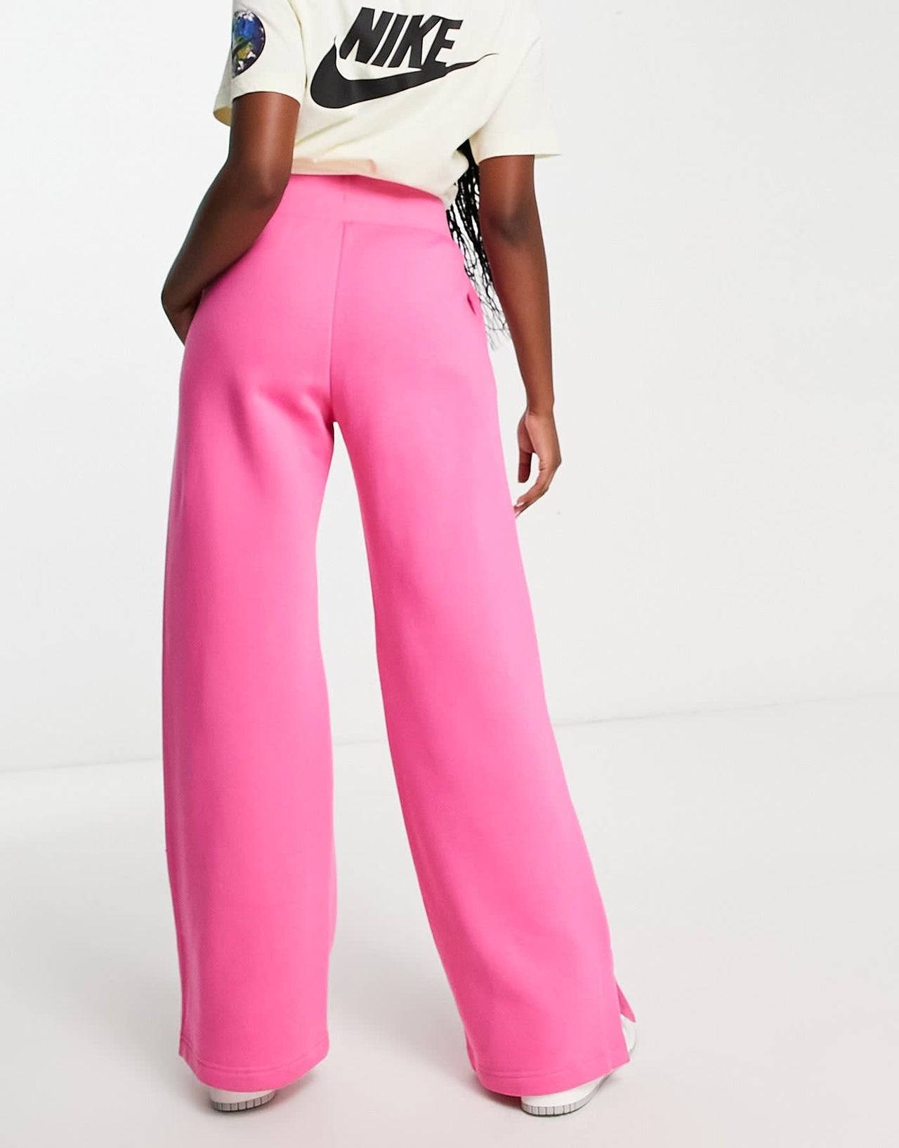 Nike Phoenix Fleece high rise wide leg joggers in pink