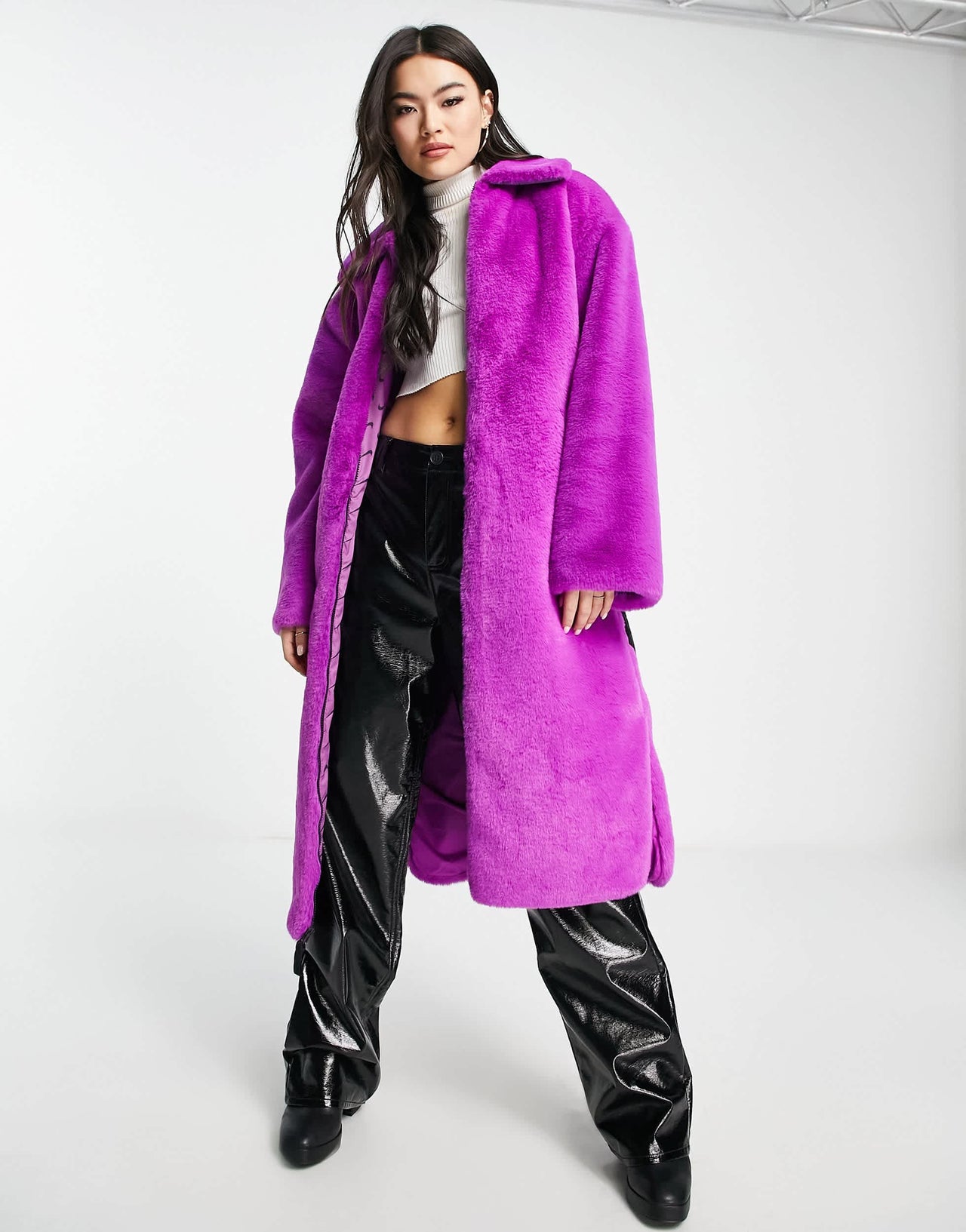 Nike long faux fur swoosh coat in vivid purple and black