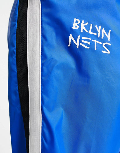 Nike Basketball NBA Brooklyn Nets tracksuit joggerss in blue