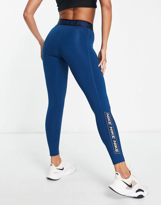 Nike Pro Training GRX Dri-FIT midrise leggings in teal blue