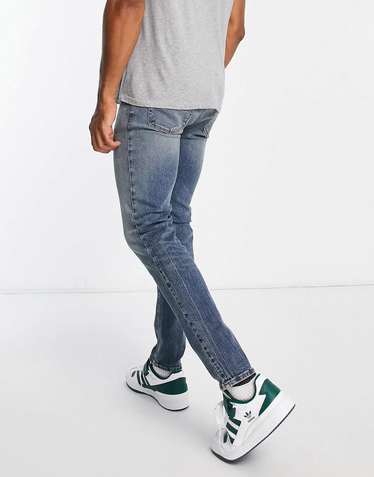 ASOS DESIGN skinny jeans in blue wash with heavy tint