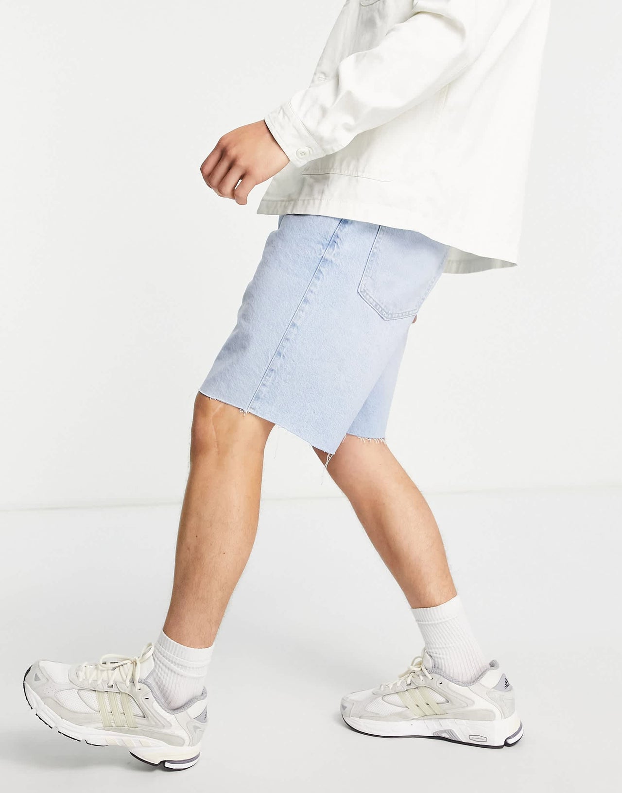 Bershka raw hem denim shorts in light blue