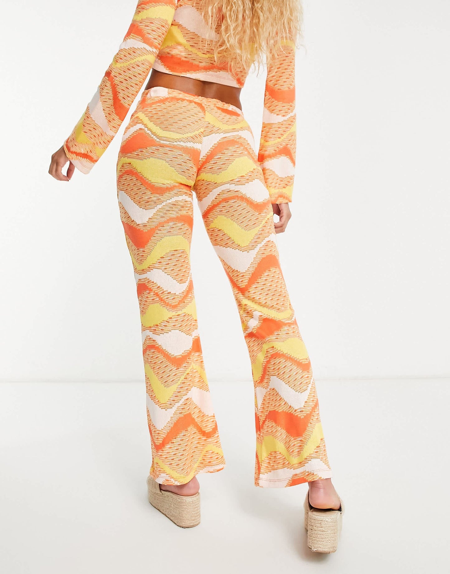 New Girl Order festival knit tie front flare trousers co-ord in orange