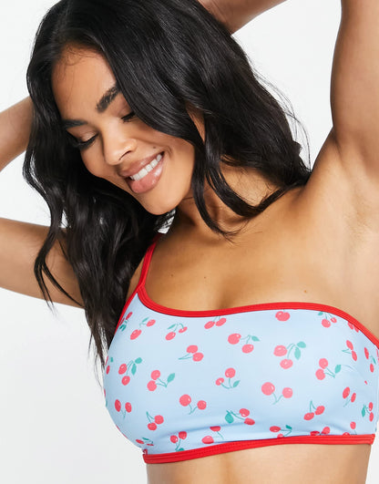 ASOS DESIGN one shoulder bikini top with contrast bind in cherry print