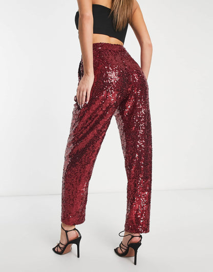 ASOS DESIGN sequin slouchy trousers in red