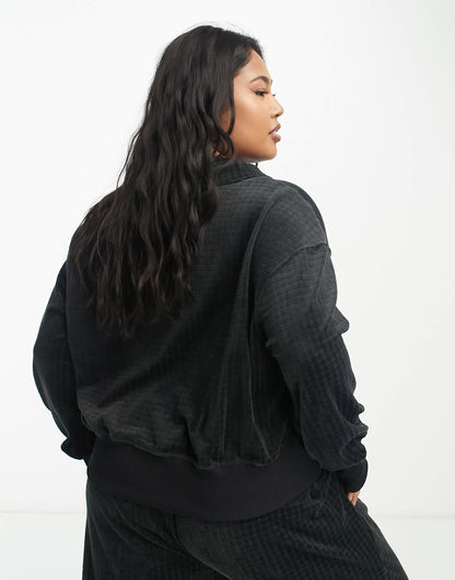 Nike Plus velour cropped polo shirt in black
