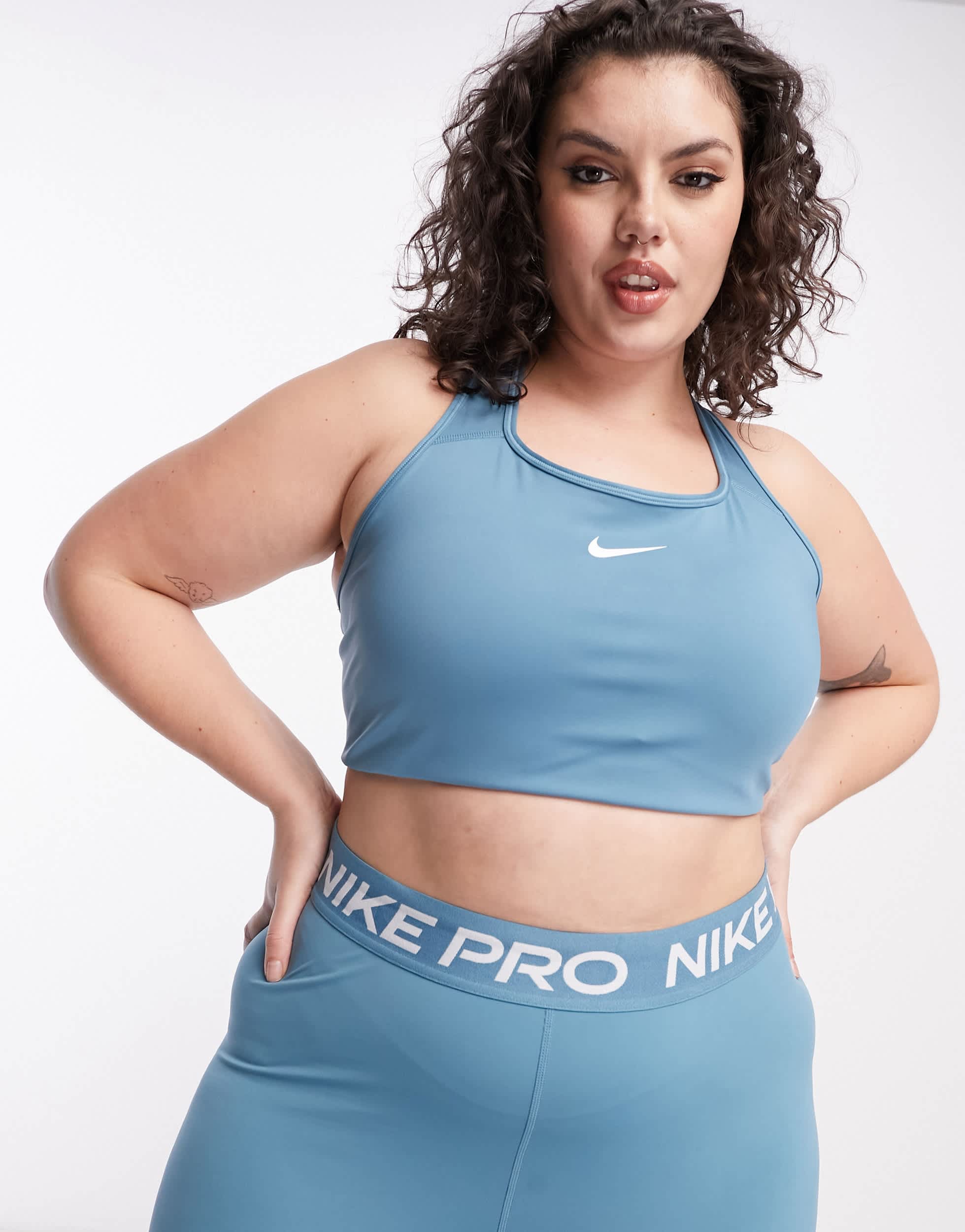Nike Training Swoosh Plus Dri-FIT padded medium support sports bra in aqua blue