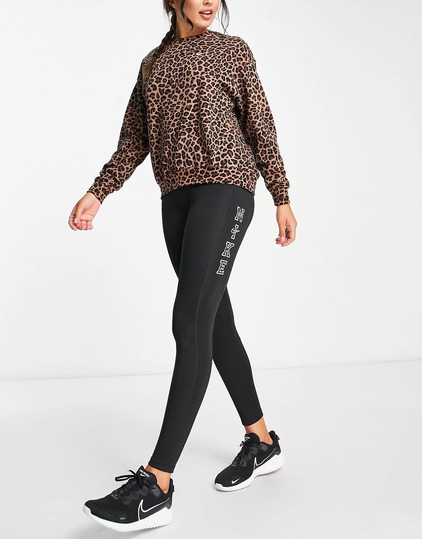 Nike One Training Dri-FIT crew neck sweatshirt in brown leopard