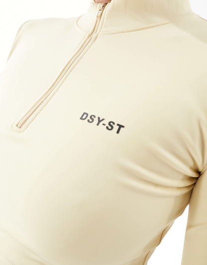 Daisy Street Active Distorted Geo 1/4 zip crop top in beige